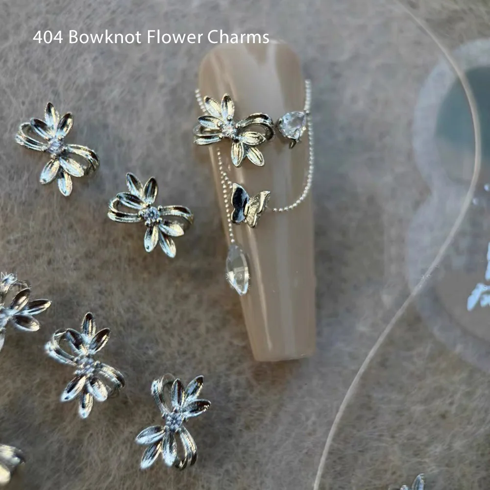 

30pcs Wholesale Elegant Grace Bowknot Flower Nail Charms Floral Bowknot Alloy Chatoyant Gems Adorn Manicure 3D Ornaments 404bulk