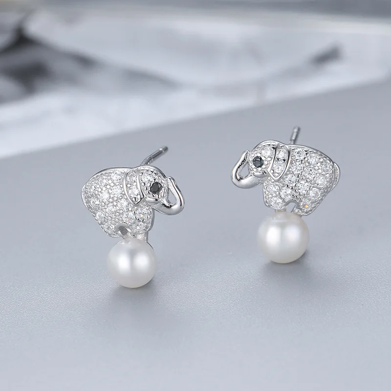 

Женские серьги-гвоздики из серебра 925 пробы с фианитами и пресноводным жемчугом