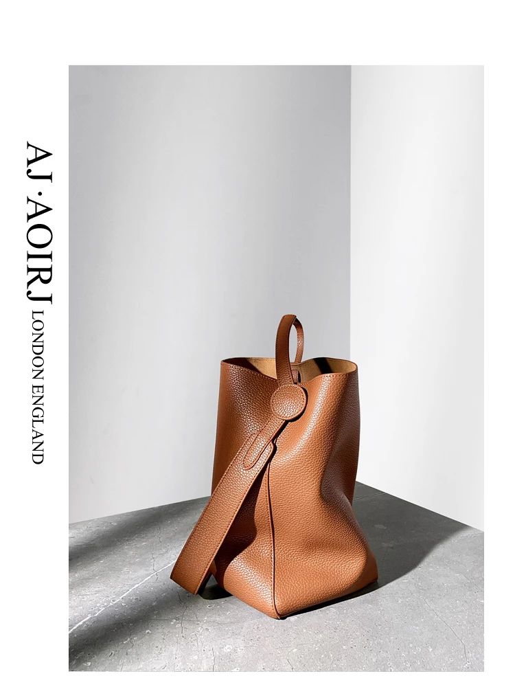 

Small design cowhide bucket bag 2022 new tote bag shoulder diagonal bag