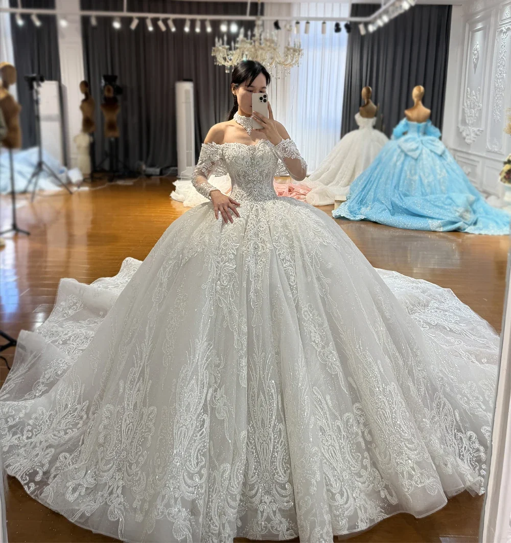 Фото Индивидуальное роскошное свадебное платье Amanda Novias: официальный новый дизайн, элегантное платье без бретелек для невесты со съемными рукавами №1