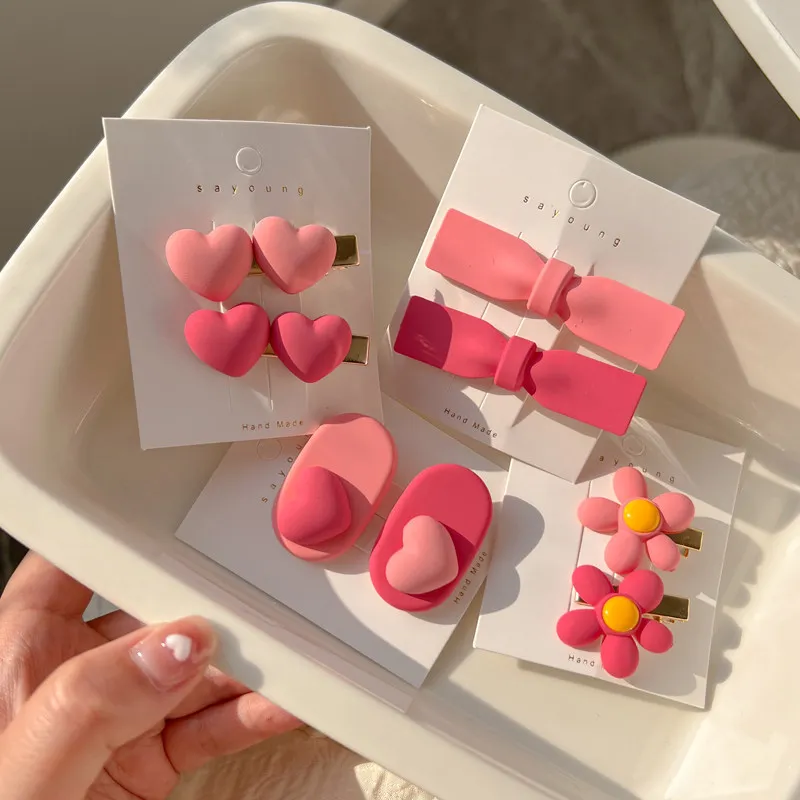 

2Pcs/set Pink Cartoon Heart Ornaments Lovely Bow Ties Hairpins Hair Clips Children Kids Baby Girls Cute Fashion Hair Accessories