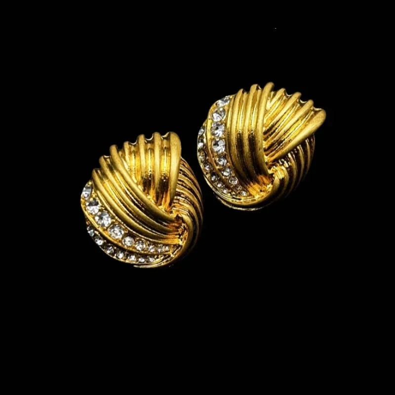 Винтажные стильные позолоченные серьги с перегравированной спиральной