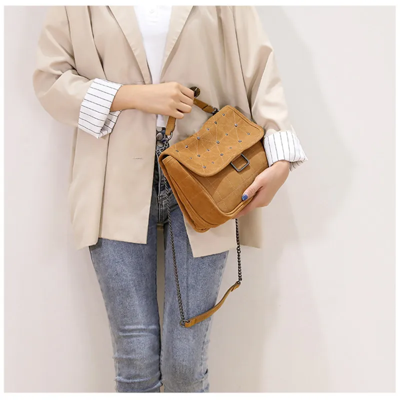 Women's bag 2022 new wandering rivet small square brown suede leather single shoulder messenger |