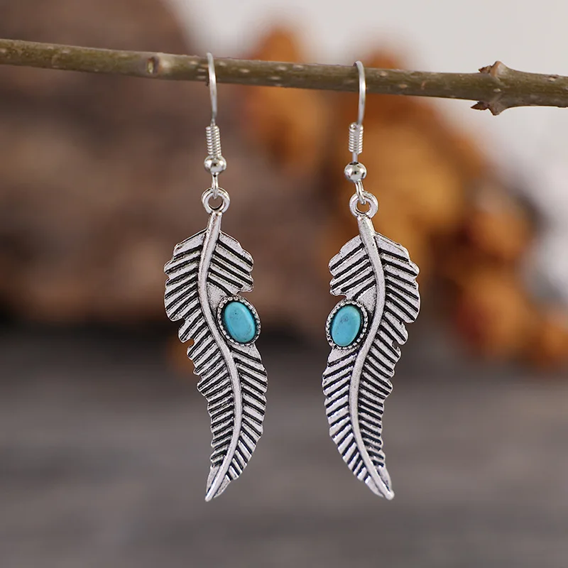 

Vintage Silver Color Carving Feather Earrings Ethnic Palace Oval Inlaid with Blue Stones Dangle Earrings for Women