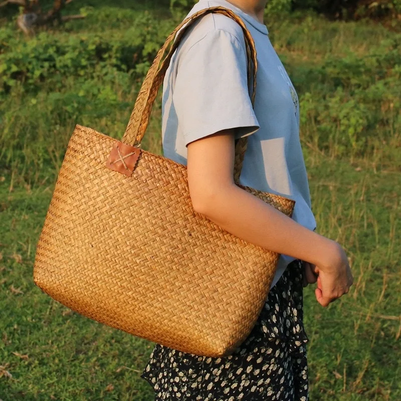 

Japanese straw bag woven literary artistic women's shoulder bag beach straw bag activity characteristic gift bag