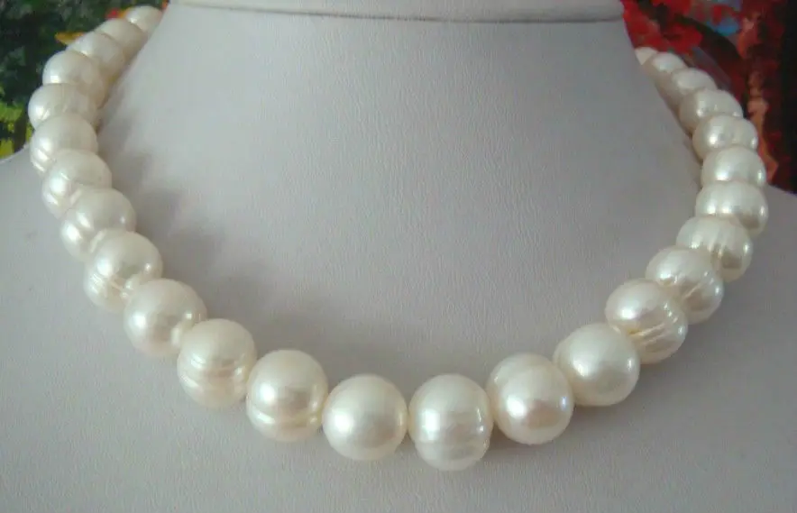 

Классическое натуральное ожерелье из белого жемчуга 12-11 мм южного моря 18 дюймов