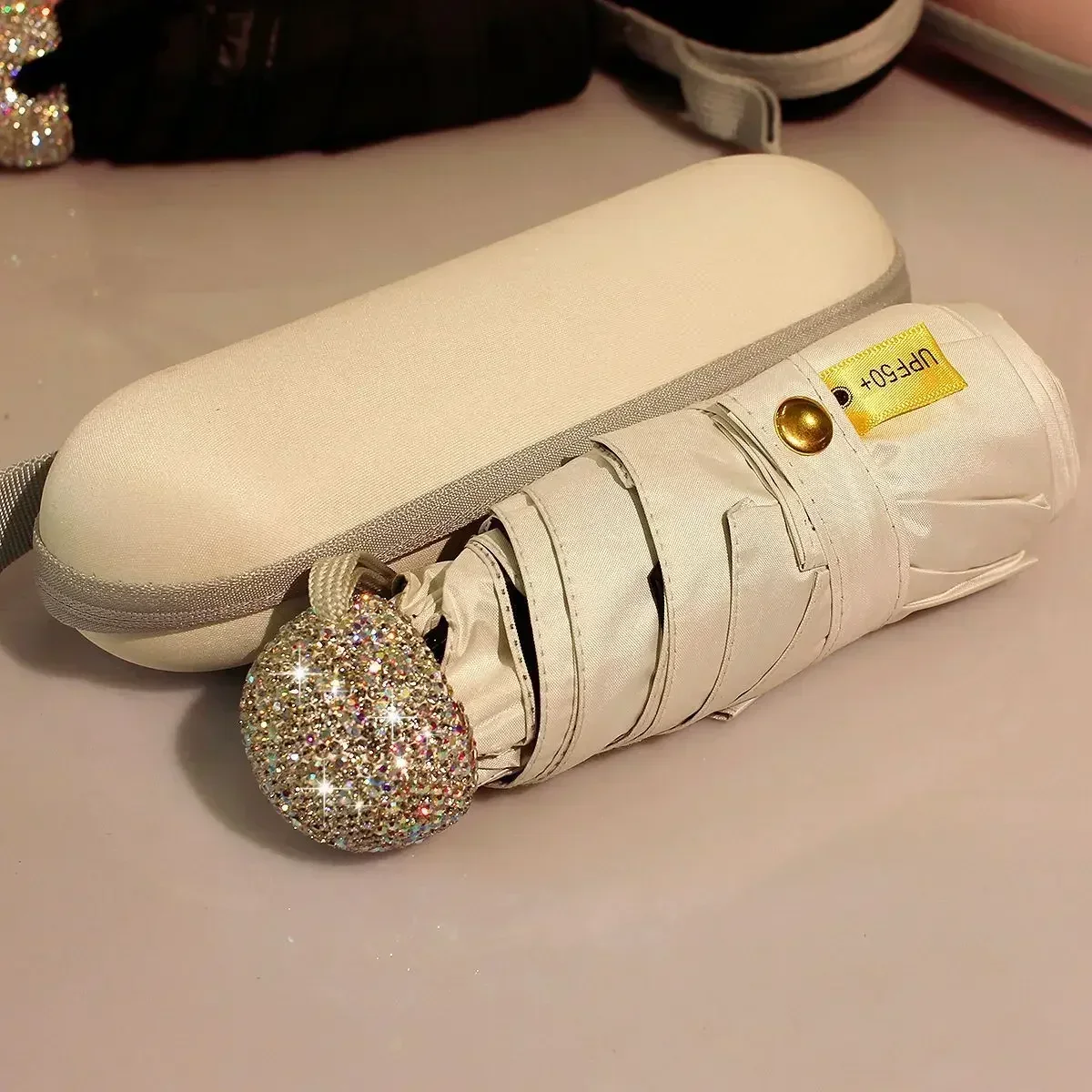 

Капсульный зонт, складной зонт со стразами и ручкой, защита от УФ-солнца, портативный дорожный зонт от солнца для девочек, блестящий дождевик