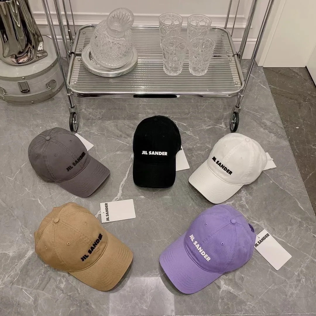 

New spring and autumn Jils Sanders letter soft top baseball cap spring and summer men and women couple big head deep top cap
