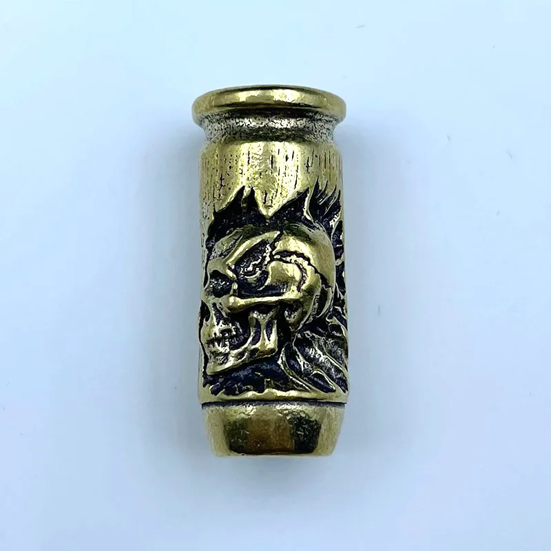 

Латунные подвески с черепом, крестом и пулей