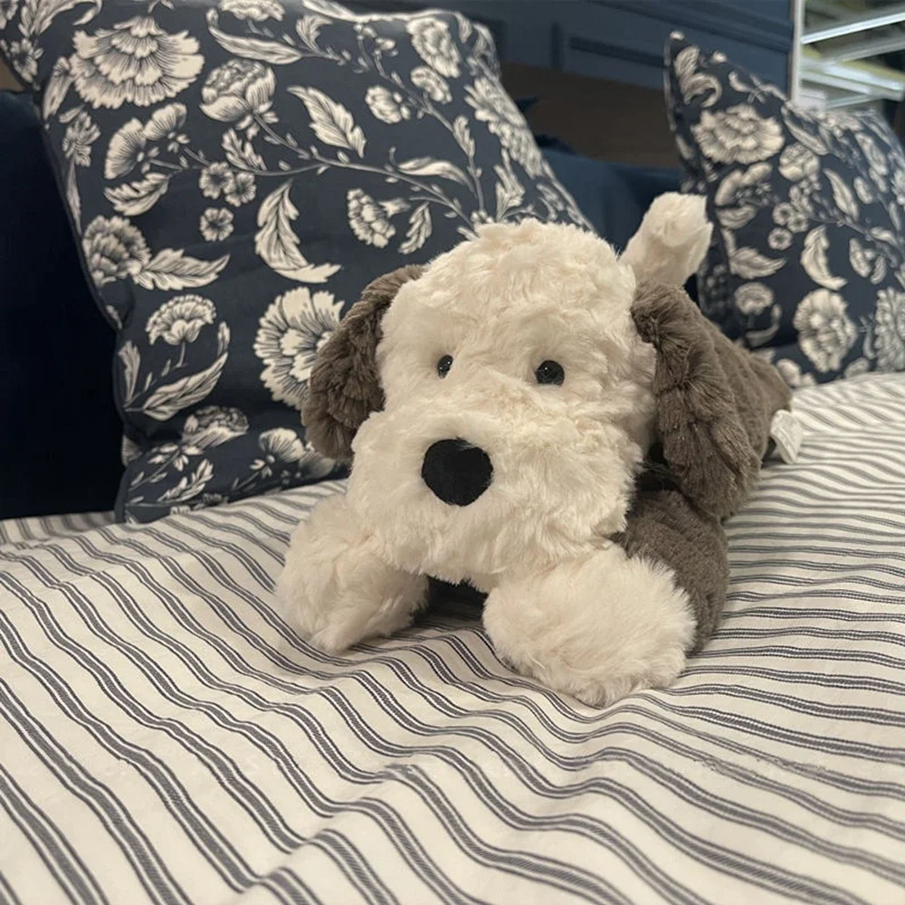 Рисунок 3 - Милая плюшевая игрушка в виде собаки-лежа