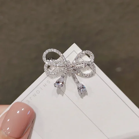 Серебряные броши с бантом