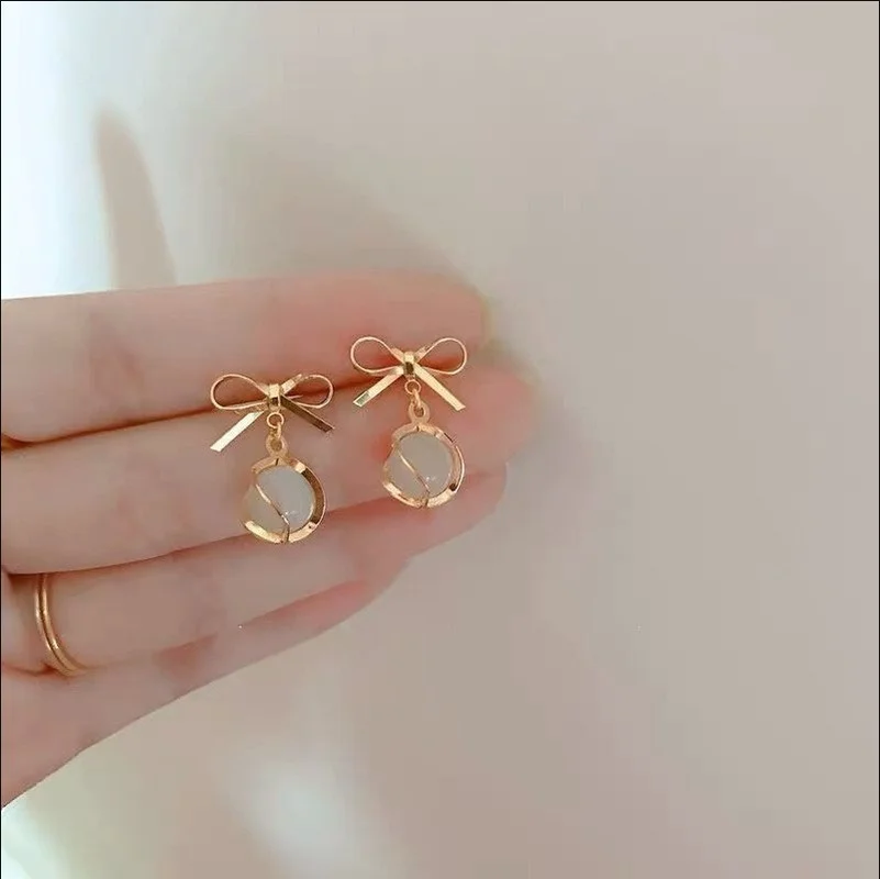 

2022 Cute New Opal Bow Earrings Pendant Korea Temperament Personality Hollow Pendant Earrings Earrings Female Factory Wholesale