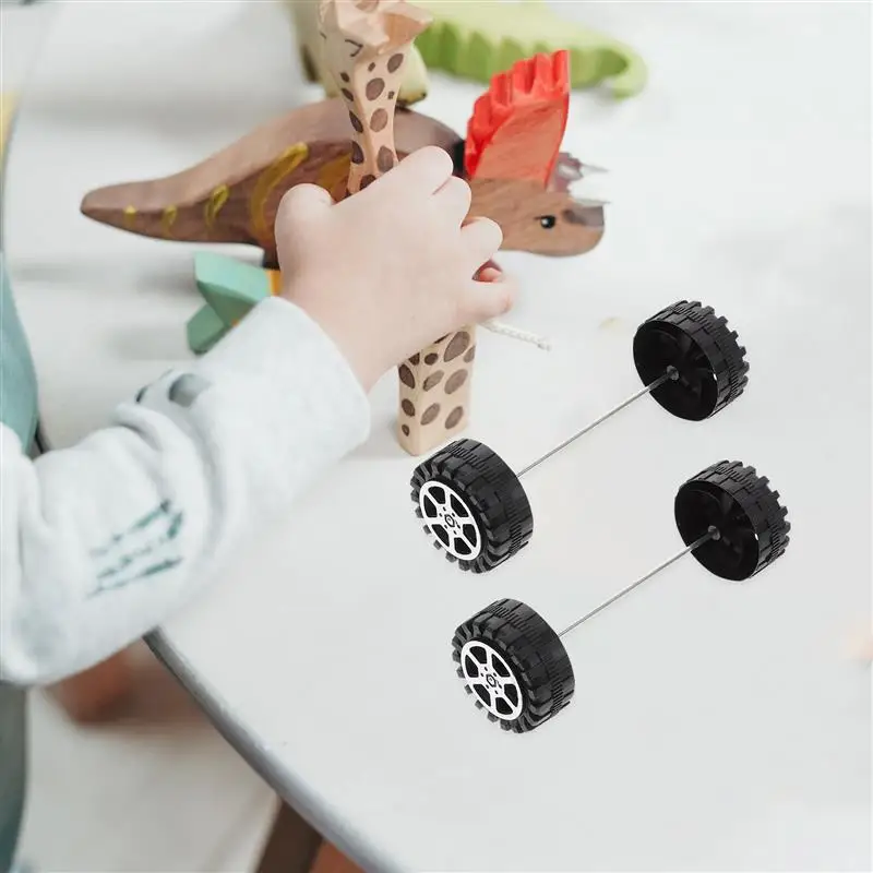 

25Pcs 4.2CM DIY Round Plastic Small Wheels with 25 Pcs 2MM Model Axle Part for DIY Handmade Crafts Supplies Home Children