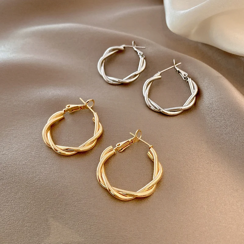 

Женские серьги-кольца в виде спирали, золотого и серебряного цвета