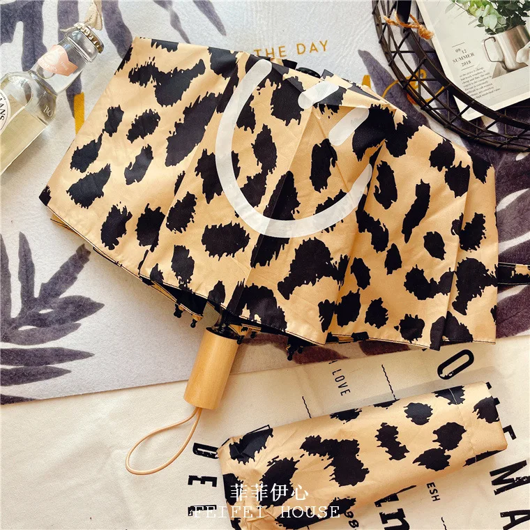 

ins leopard print smiley umbrella three-foldingainny and sunny dual outdoor umbrella
