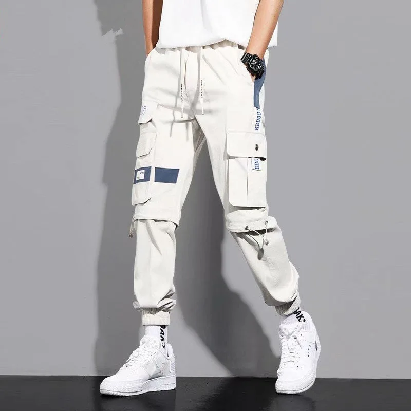 

Spring and Autumn Overalls Male Korean Version of The Trend Loose Bunching Feet Everything Student Casual Haren Pants Hip Hop