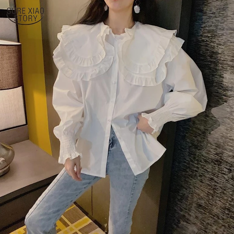 

Женская блузка на пуговицах с рукавами-фонариками и воротником «Питер Пэн»