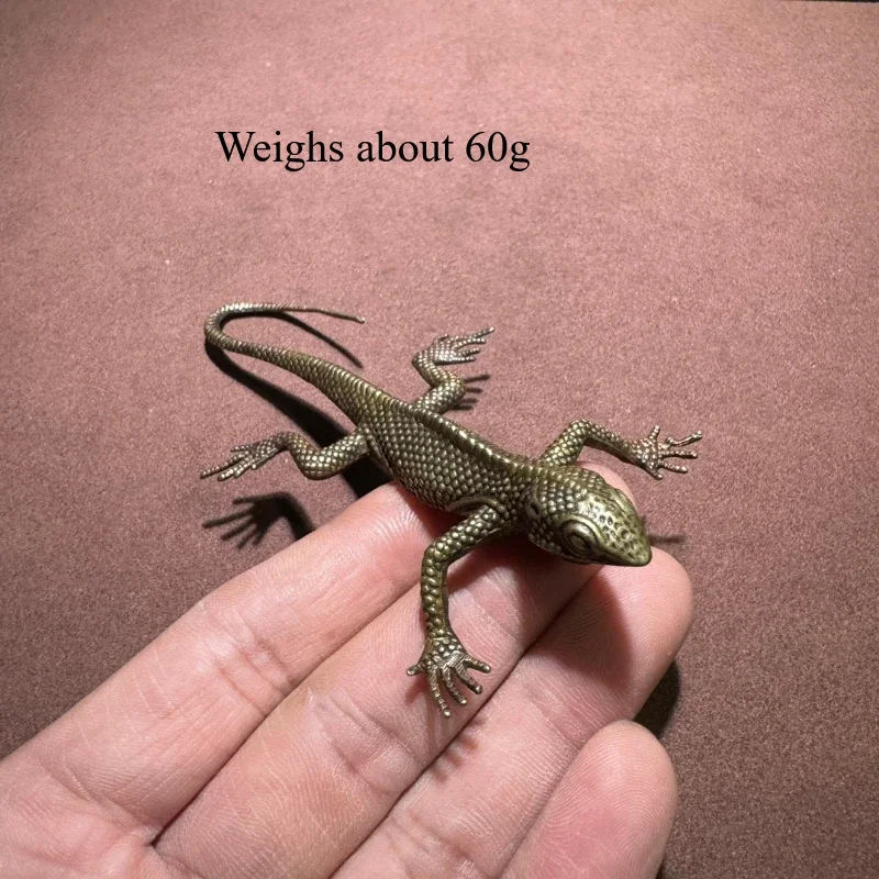 

Миниатюрная металлическая статуэтка ящерица