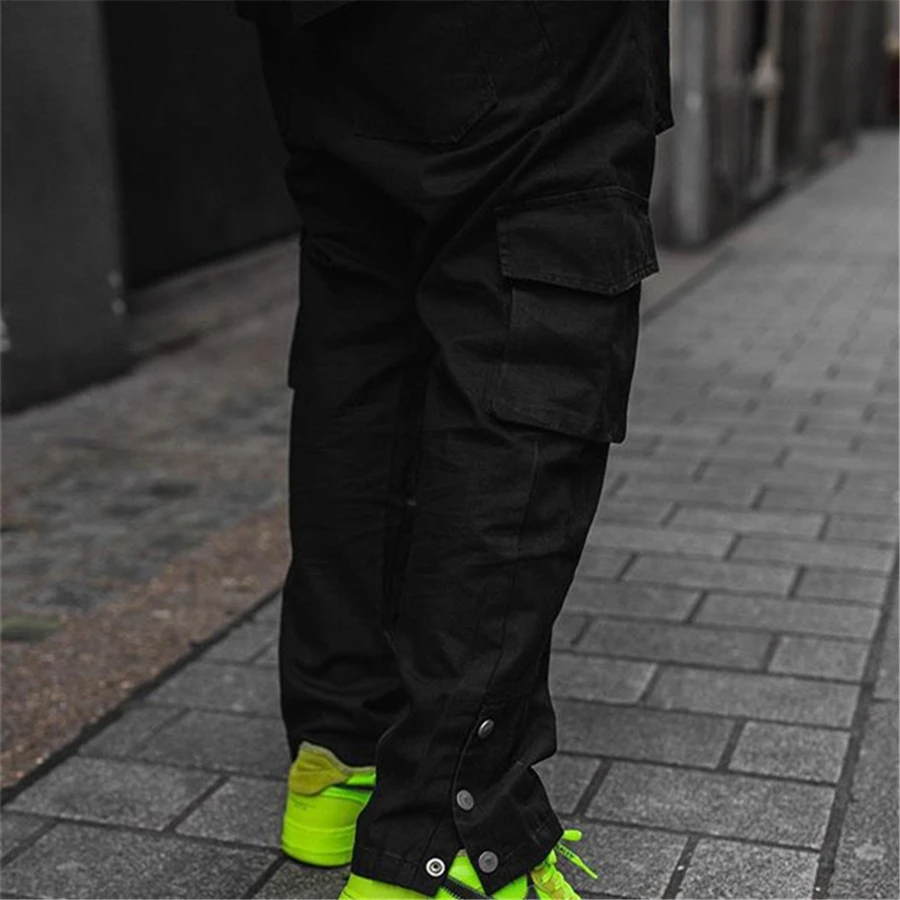 

Pantalones bombachos con bolsillos laterales para hombre, pantalón informal con cintas, estilo Hip Hop, ropa de calle a la moda,