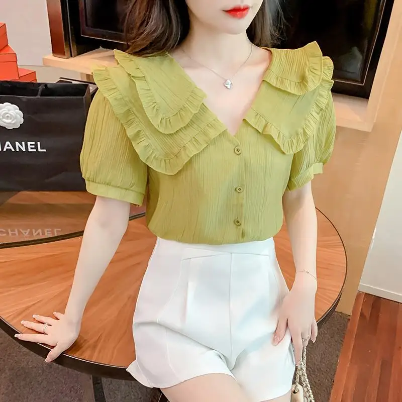 

Blouse female 2022 new design sense of niche fungus doll collar short -sleeved top women high -level and unique beautiful shirt