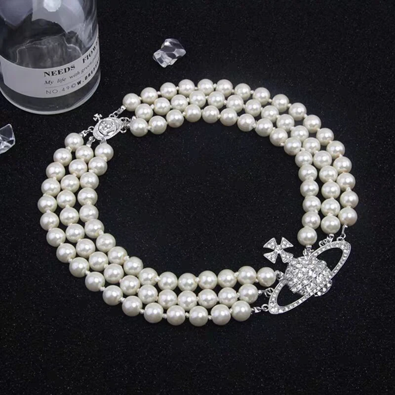 

Женское трехслойное ожерелье с жемчужинами и кристаллами