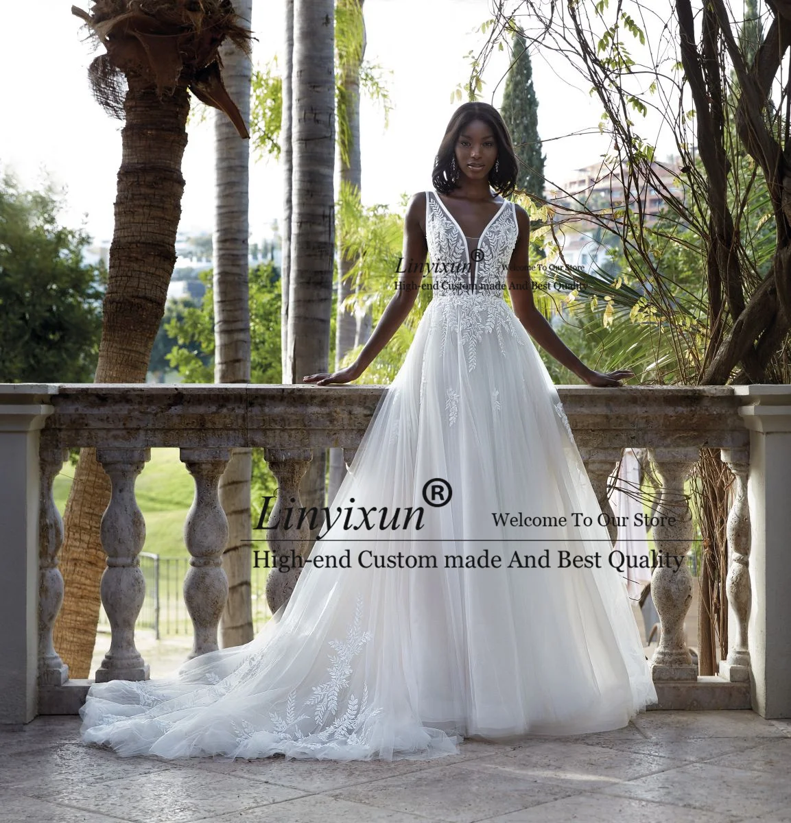 owano suknie ślubne A Line dla czarnej dziewczyny Seksowne aplikacje z dekoltem w szpic Koronkowe bez pleców Tren dworski Vestido De Mariages
