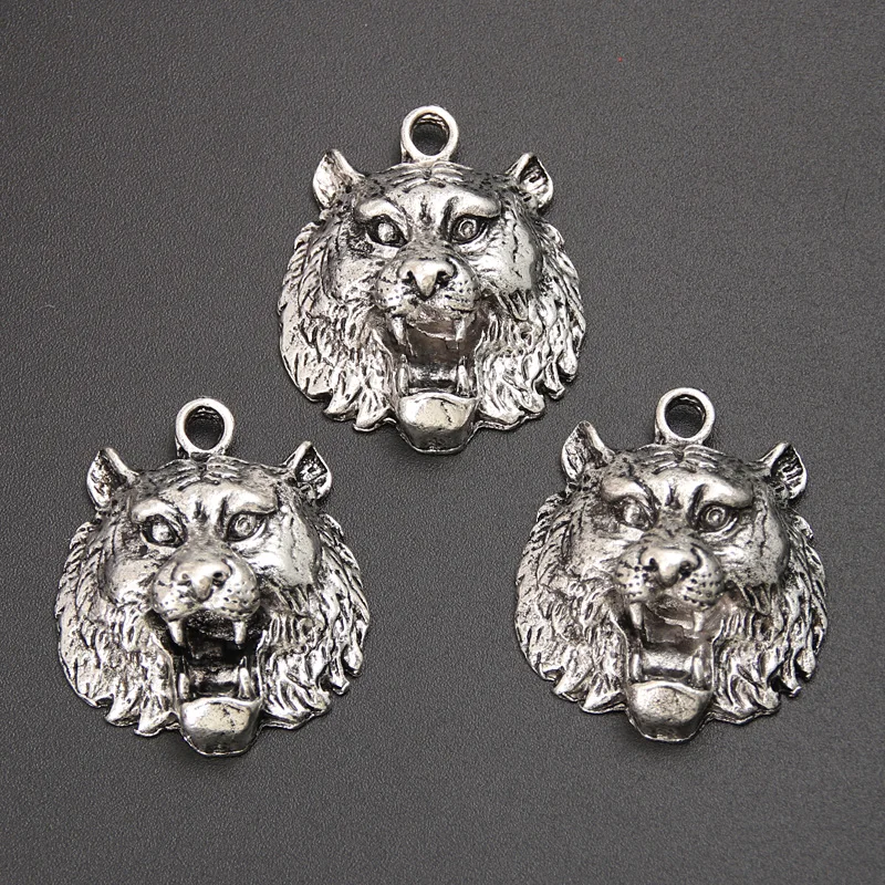 

Подвеска в виде головы тигра, серебристого цвета, 31x26 мм, 4 шт.