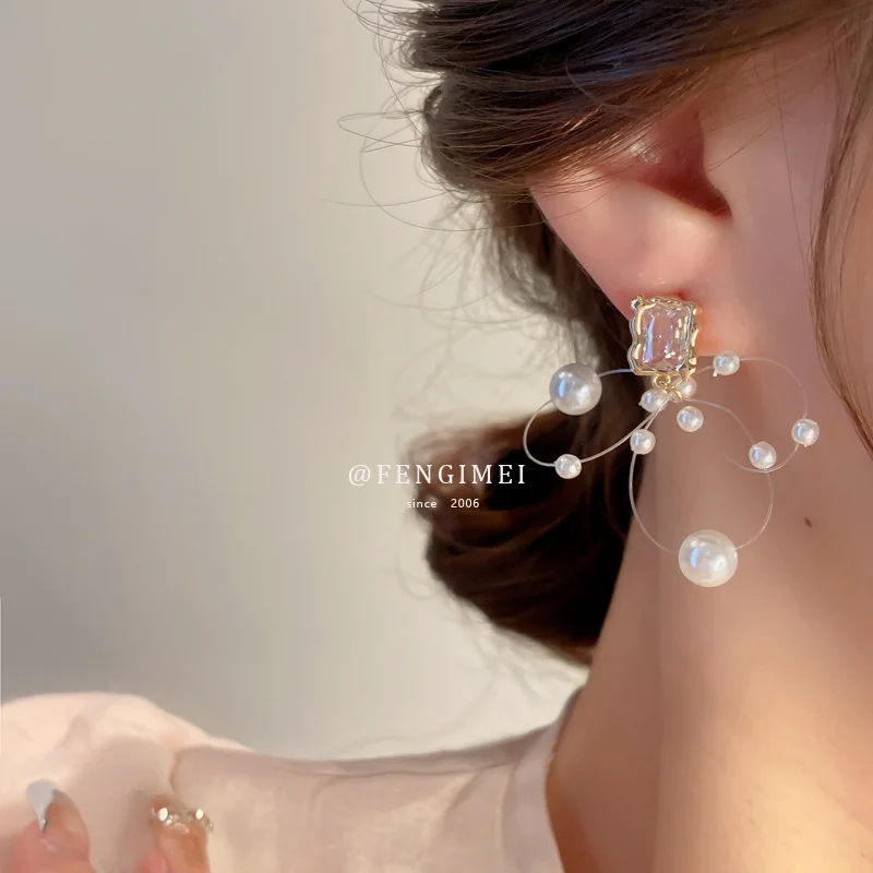 

Silver Needle Korean Fashion Zircon Fish Line Pearl Earrings Niche Design Earrings Earrings Temperament New Earrings for Women