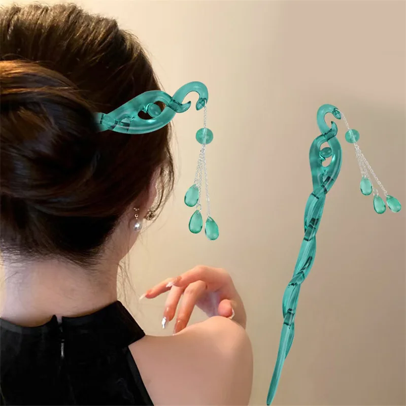 Металлическая зелёная заколка для волос в форме змеи