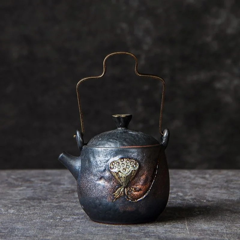 

Embossed Lotus Ceramic Teapot with Metal Handle 240ml