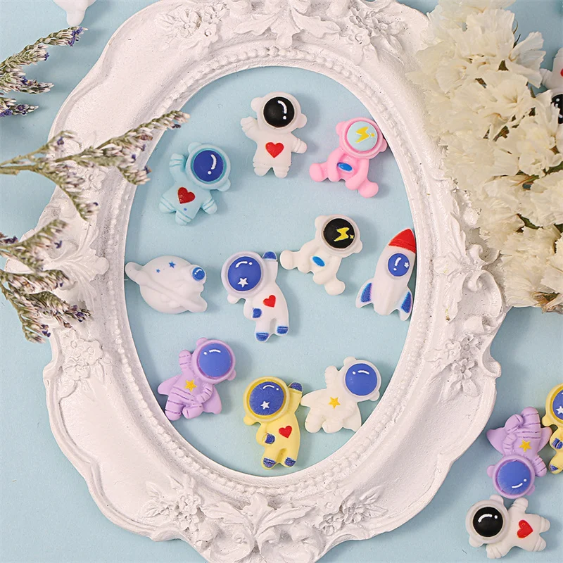 

20pcs Colorful Cartoon Resin Accessories Nail Charms 3D Acrylic Astronaut Rocket Kawaii Design Manicure Decorations DIY Ornament