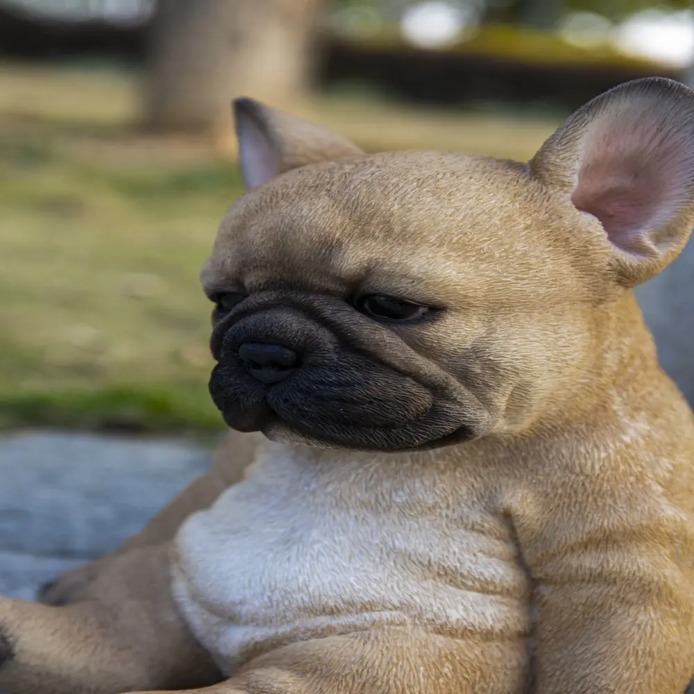 

SLEEPY FRENCH PUPPY STATUE SITTING