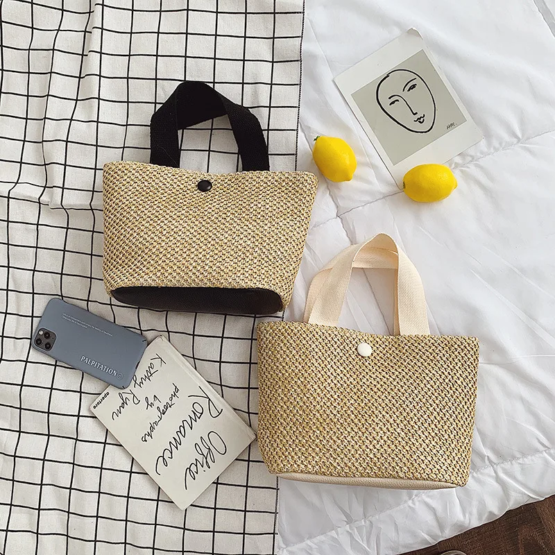 

2022 Straw Woven Bucket Portable Solid Color Buckle Summer All-match Fashion Beach Vacation INS Handbags Women Bags Designer