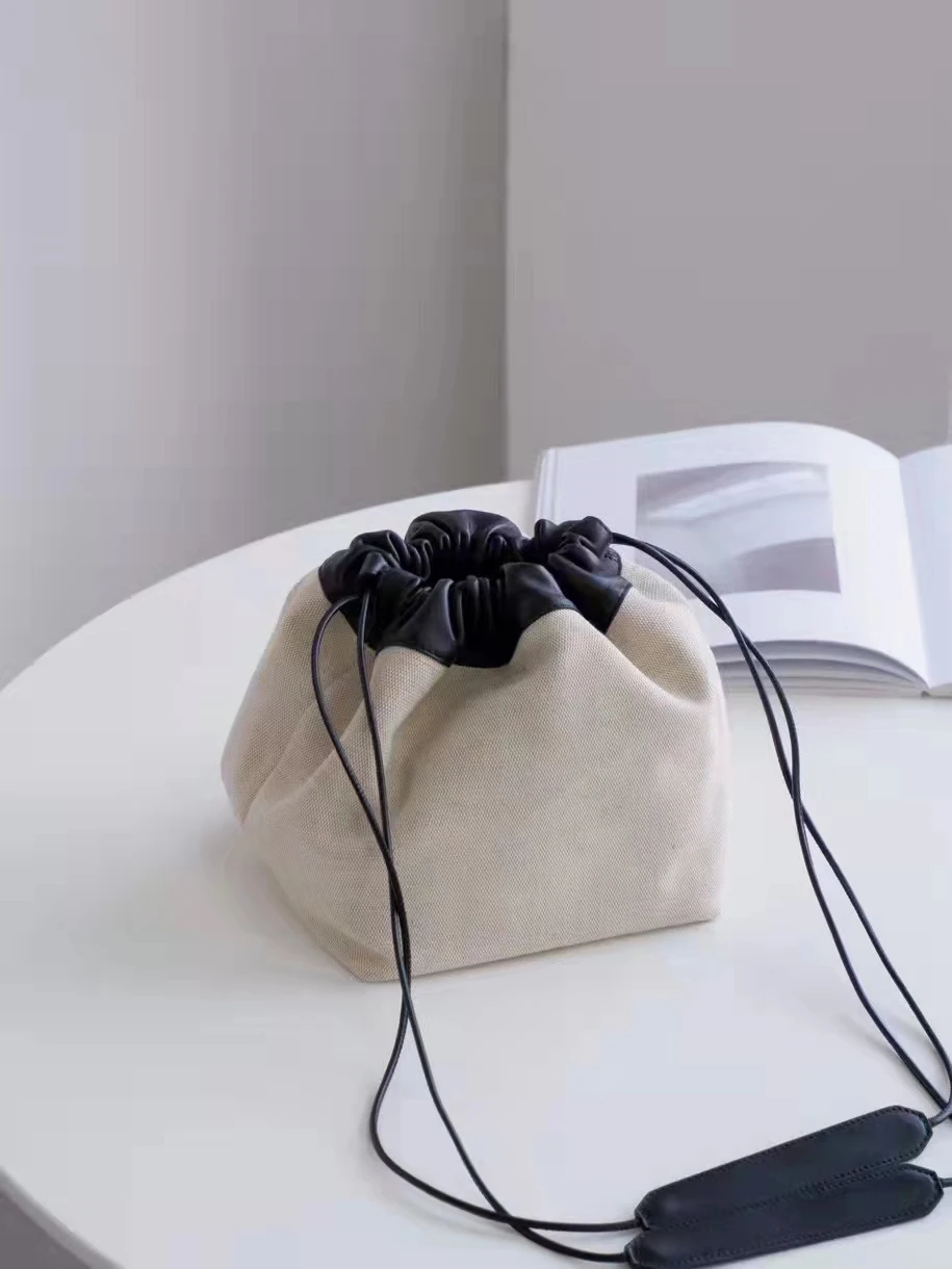 

Ms summer J1 canvas real leather bag draw string bucket double his bread