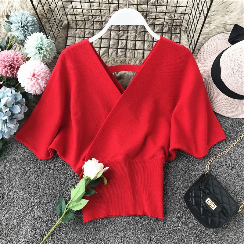 

Clothland Women Elegant V Neck Knitted Blouse Knitwear Backless Batwing Sleeve Shirt Chic Summer Tops DA67