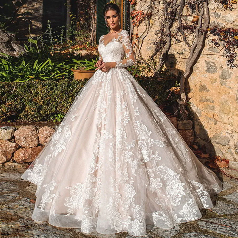 

2023 New Ball Gown Wedding Dress Long Sleeves Robe De Mariee Illusion Button Back Sheer Neck Gorgeous Bridal Gowns Lace Applique