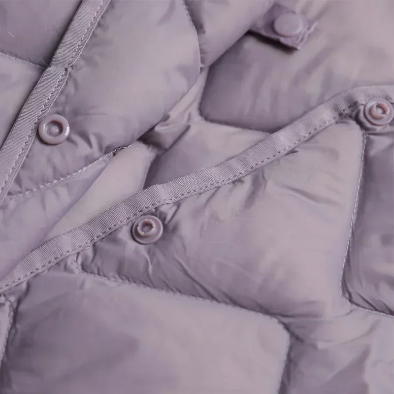 Женский ультратонкий пуховик в корейском стиле с теплой подкладкой и застежкой