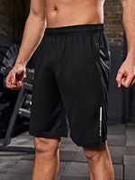 men letter graphic slant pocket sports shorts