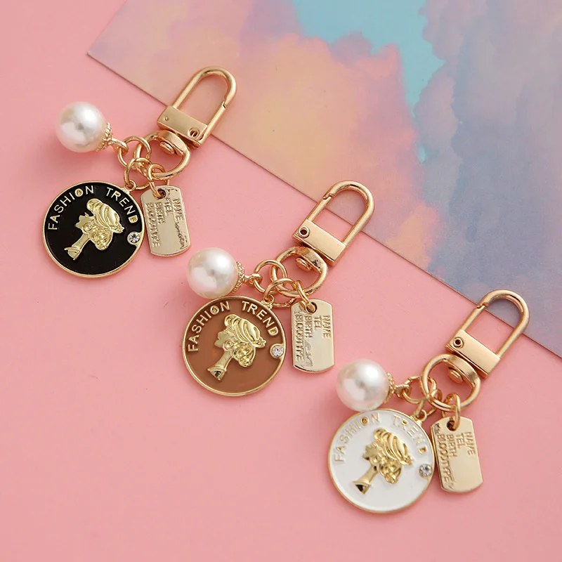 

New metal plate keychain pendant lovely pearl beauty head alloy listing accessories headphone bag decoration