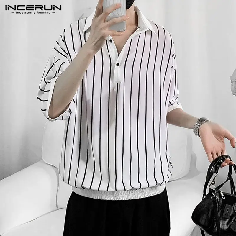 

Блузка мужская в полоску, свободного кроя, с средним отворотом