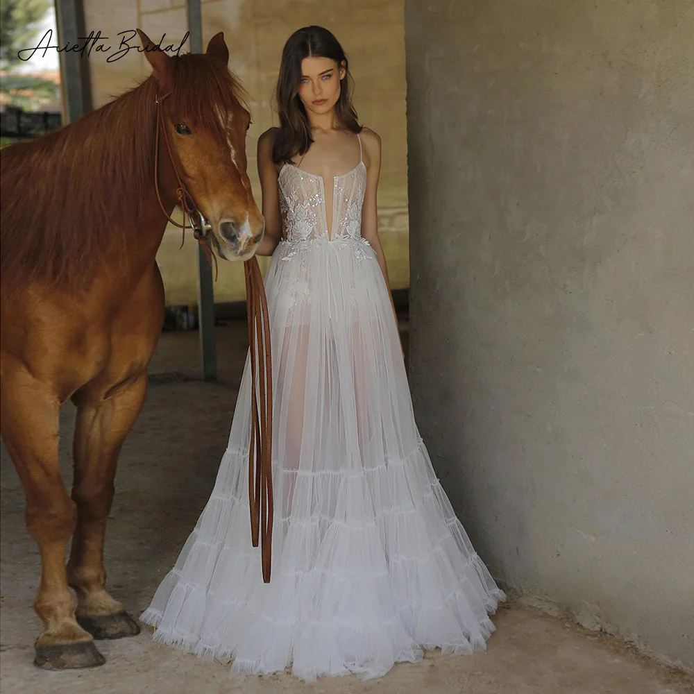 

Arietta Sexy Illusion Tulle A-Line Wedding Dresses Spaghetti Straps Lace Appliques Tiered Bride Dresses Backless Wedding Gowns