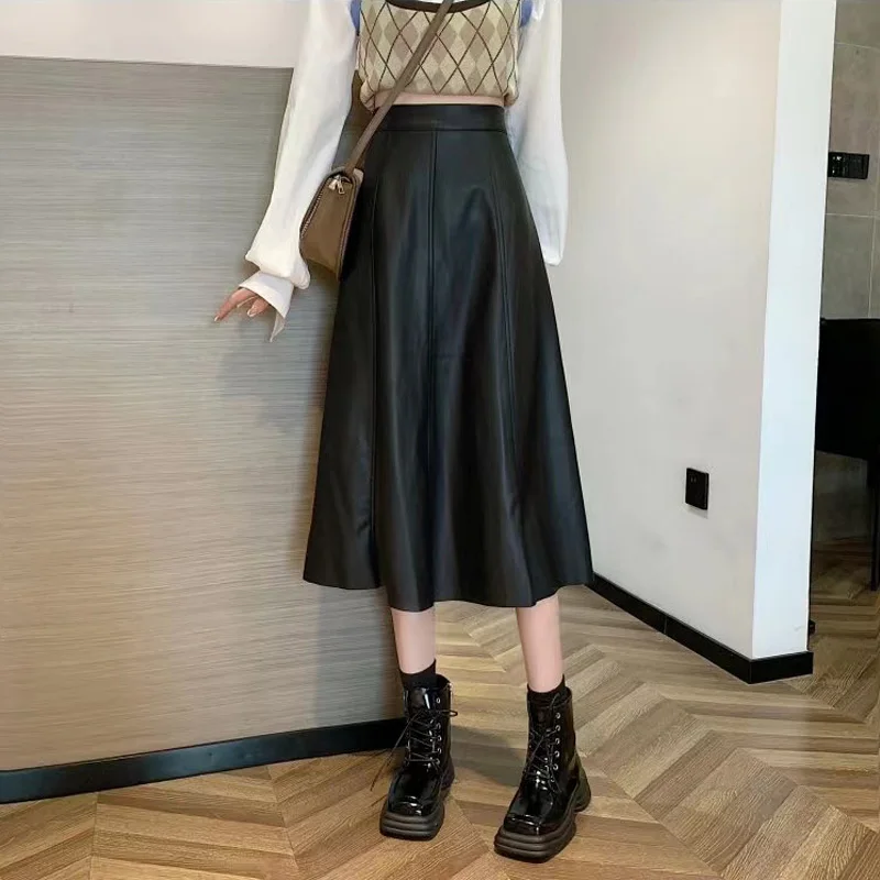 

Женская черная кожаная юбка, Осень-зима 2022, новая модная тонкая трапециевидная юбка средней длины с высокой талией в Корейском стиле
