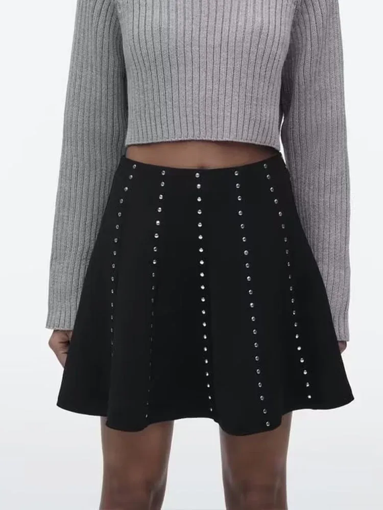

New Women's High Waist Skirt A-line hem with concealed zipper closure at back seam Black rivet embellished mini skirt