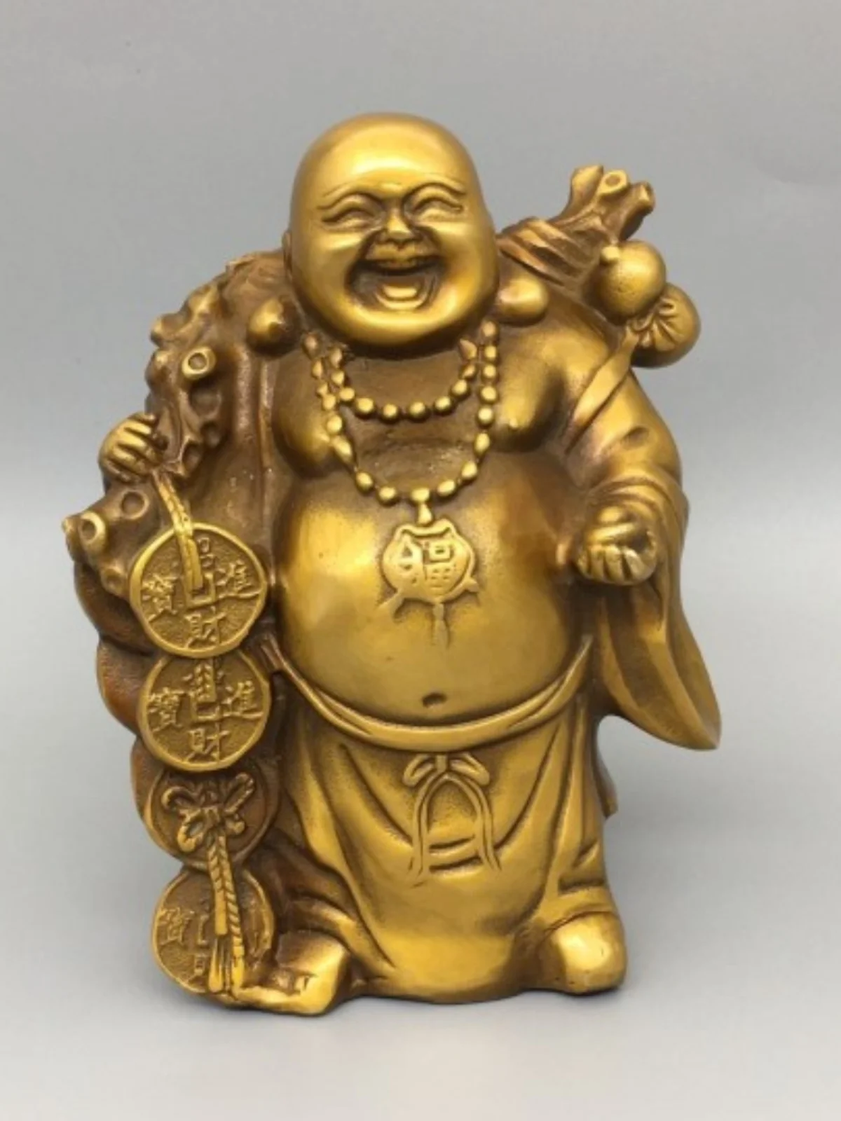 Латунные украшения Maitreya позволяют выбрать деньги отбивать золотые слитки и