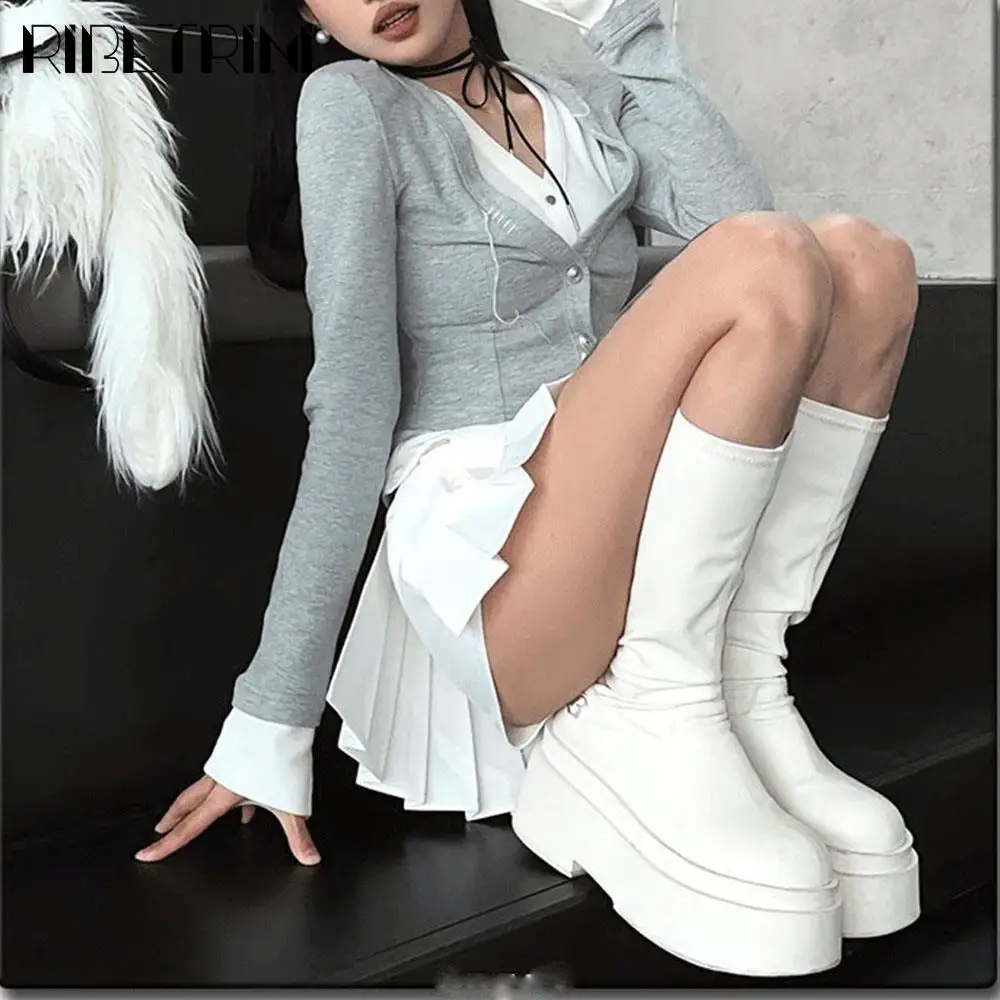 Женские ботинки до середины икры на массивном блочном каблуке