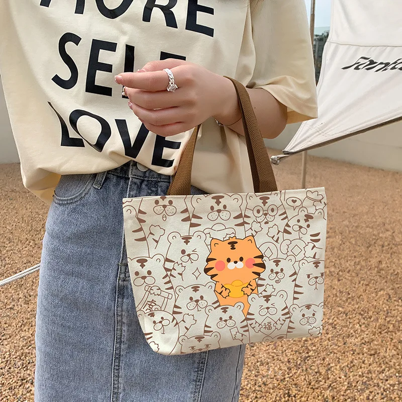 

Canvas Bag for Women Spring/Summer 2023 New Handheld Bag, Bento Bag for Students, Office Workers, Handheld Small Cloth Bag