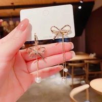 elegant asymmetric diamond studded pearl bow earrings for women korean fashion design retro temperament personality jewelry gift