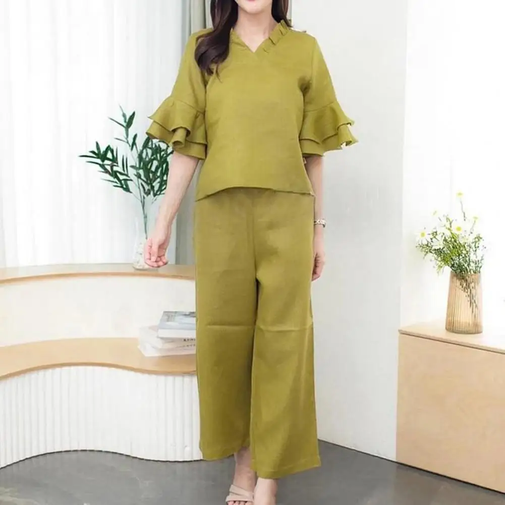 

This Two-piece Set Includes A Top And Wide-leg Pants. The Fit Is Loose And Comfortable.