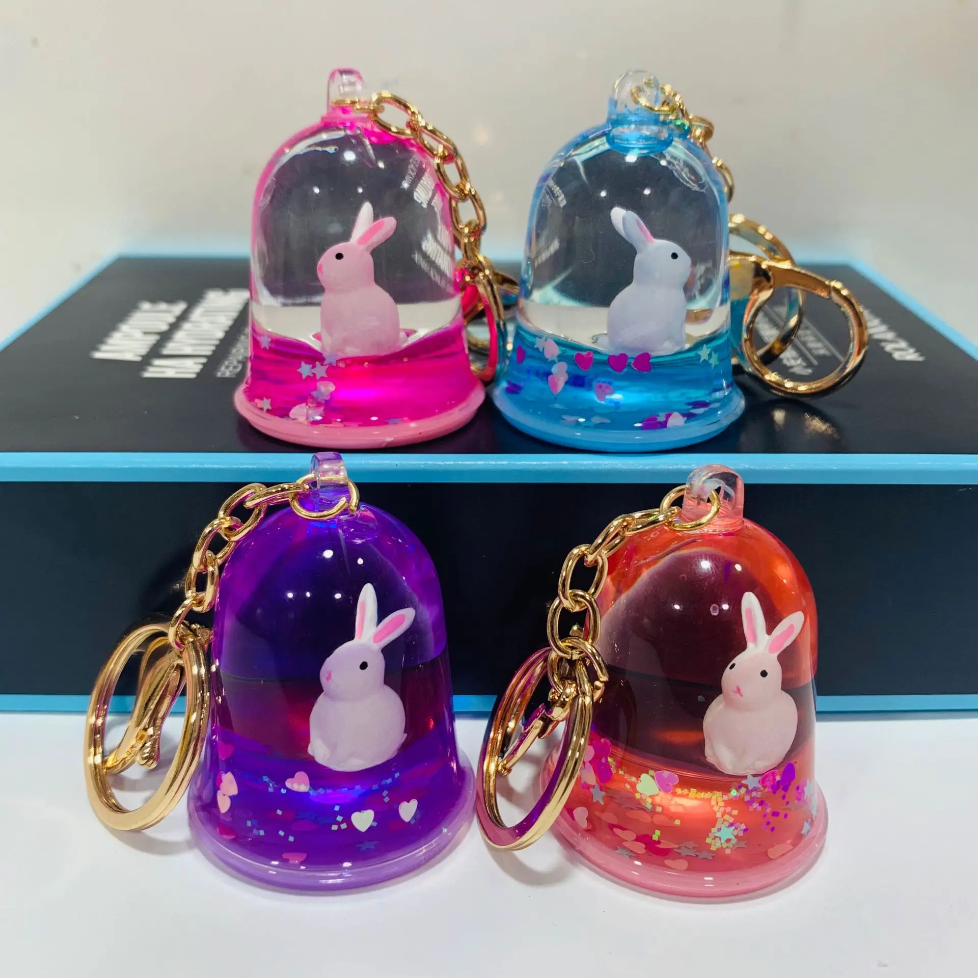 

New Creative Gift Quicksand Liquid into the Oil Keychain Bag Pendant Net Red Rabbit Hourglass Car Pendant Jewelry Wholesale