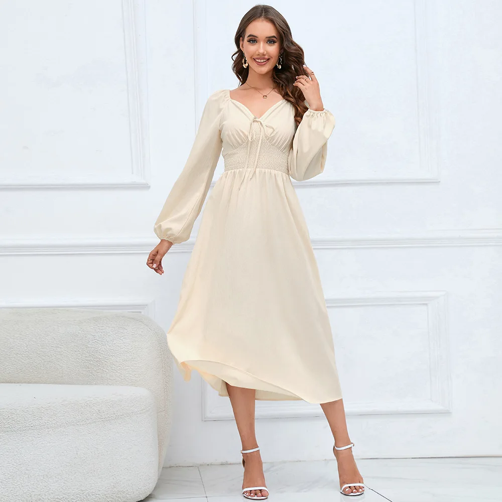 

Женское облегающее платье с V-образным вырезом и длинным рукавом